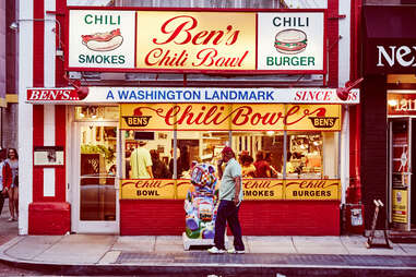 ben's chili bowl, a washington landmark with a pedestrian out front
