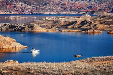 A boat pilotes across Lake Mead.