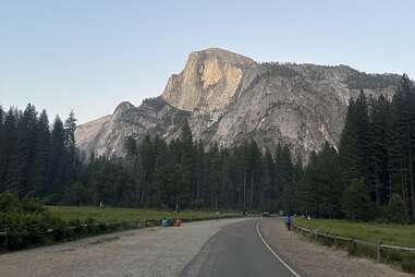 the bike path in front of half dome in yosemite valley, ca