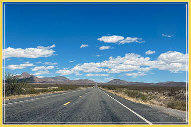 the open road of a straight highway in the New Mexico desert