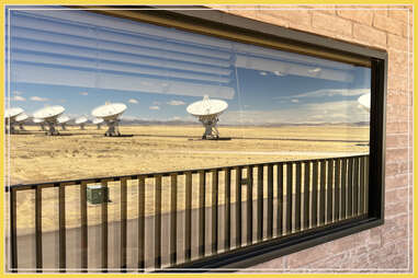 the reflection of the satellite dishes at the very large array in new mexico